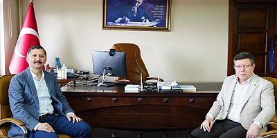 Fahrettin Tuğral Kırkağaç Kaymakamı Zafer Oktayı Ziyaret Etti